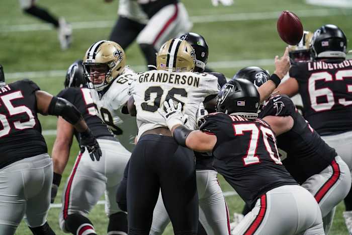 New Orleans defensive end Carl Granderson (96) hits Falcons quarterback Matt Ryan (2) causing a fumble recovered by the Saints. Mandatory Credit: Dale Zanine-USA TODAY